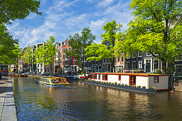 Tourist boat on Prinsengracht canal, Amsterdam, The Netherlands, Europe