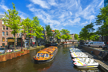 Tourist boat on Prinsengracht canal, Amsterdam, The Netherlands, Europe