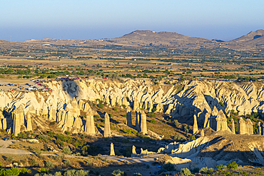 Aerial view of rock formations in Love Valley at sunrise, Goreme, Goreme Historical National Park, UNESCO World Heritage Site, Cappadocia, Central Anatolia Region, Anatolia, Turkey, Asia Minor, Asia