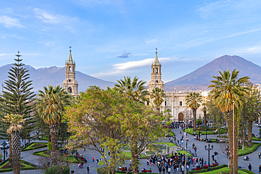 El Misti and Chachani volcanos rising above Basilica Cathedral of Arequipa at Plaza de Armas Square, UNESCO World Heritage Site, Arequipa, Peru, South America