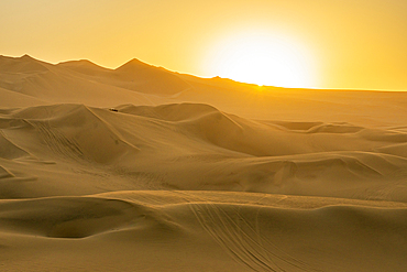 Sand dunes in desert at sunset, Huacachina, Ica District, Ica Province, Ica Region, Peru