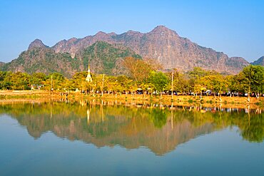 Lake by Kyaut Ka Latt Pagoda and mountain, Hpa-An, Myanmar