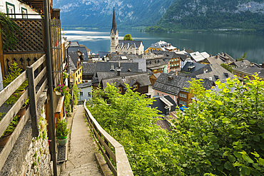 Elevated view of Hallstatt city center dominated by Evangelisches Pfarramt church, Hallstatt, UNESCO World Heritage Site, Austria, Europe