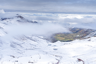 Snow-covered landscape near Rainbow Mountain (Vinicunca), Red Valley, Cusco, Peru, South America