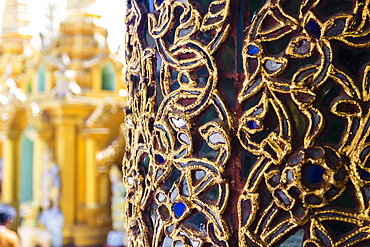 Detail of decorated column inside temple, Shwedagon Pagoda complex, Yangon, Myanmar (Burma), Asia