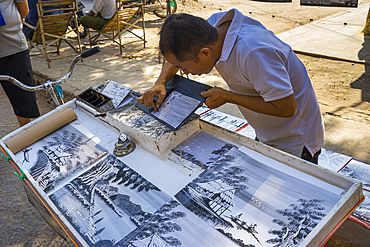 Man drawing with ink, Mandalay, Myanmar (Burma), Asia