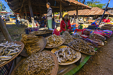 Vendors selling dried fish at market, Inn Thein, Lake Inle, Shan State, Myanmar (Burma), Asia