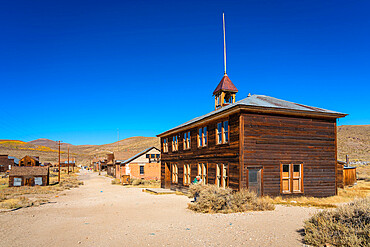 Facade of abandoned wooden deserted buildings in Bodie ghost town, Mono County, Sierra Nevada, Eastern California, California, USA