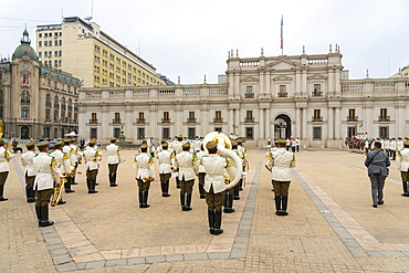 Policemen performing changing of guards ceremony in front of La Moneda Palace, Santiago, Santiago Metropolitan Region, Chile, South America