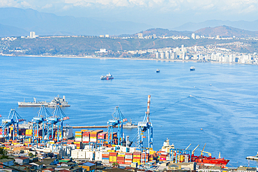 High angle view of cranes and cargo containers stacked at Port of Valparaiso, Valparaiso, Valparaiso Province, Valparaiso Region, Chile, South America