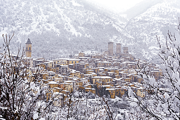 View of the village and the castle of Pacentro under heavy snowfall, Maiella National Park, L'Aquila province, Abruzzo, Italy, Europe