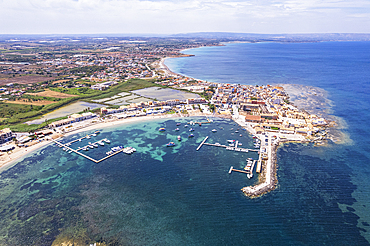 Aerial drone shot of the fishing village of Marzamemi in blue water, Marzamemi, Pachino municipality, Siracusa province, Sicily, Italy, Mediterranean, Europe