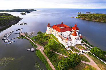 Lacko Castle at sunset, aerial view, Kallandso island, Vanern lake, Vastra Gotaland, Sweden, Scandinavia, Europe