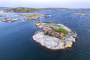 Wooden cottages on rocky islands at dusk, aerial view, Bohuslan, Vastra Gotaland, West Sweden, Sweden, Scandinavia, Europe