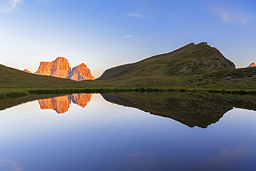 Baste Lake and the reflection of the Pelmo mountain, at sunset, Giau Pass, Dolomites of Belluno, Veneto, Italy, Europe