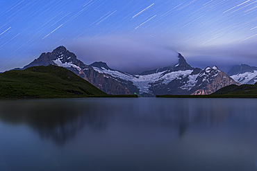 Star trail over Bachalpsee and the Bernese Oberland mountains, Grindelwald, Bern Canton, Switzerland, Europe