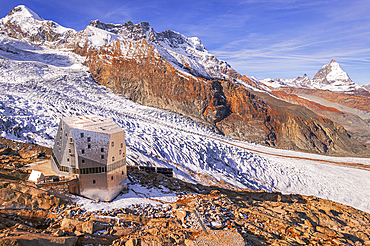 Monte Rosa hut (hutte) with the Matterhorn pyramid in the background, Gorner glacier, Zermatt, Valais canton, Switzerland, Europe