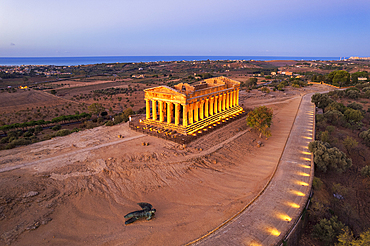 Illuminated Concordia Greek Temple seen from above at dawn, Valley of the Temples, UNESCO World Heritage Site, Agrigento, Sicily, Italy, Mediterranean, Europe