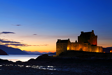 Eilean Donan Castle at dusk, Loch Duich, Highland Region, Scotland, United Kingdom, Europe