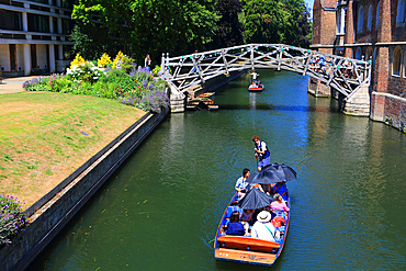 Punting on the River Cam by the Mathematical Bridge, Queen's College, Cambridge, England, UK