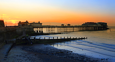 Cromer Pier at sunset, summer evening, Norfolk, England, UK