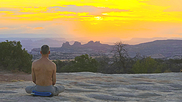 Meditation at sunrise, Canyonlands National Park, Utah, USA