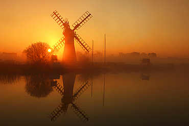 Winter sunrise over Thurne Mill, Norfolk Broads, Norfolk, England, United Kingdom, Europe