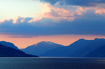 Mountains at dawn above Nordfjorden in Oldedalen Valley, near Olden, Vestland, Norway, Scandinavia, Europe