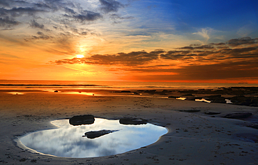 Sunset over the Bristol Channel from Dunraven Bay, Southerndown, South Wales, UK