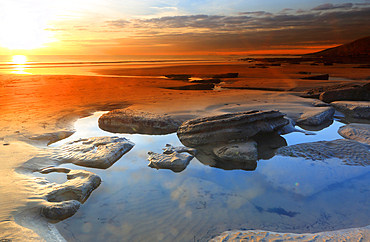 Sunset over the Bristol Channel from Dunraven Bay, Southerndown, South Wales, UK