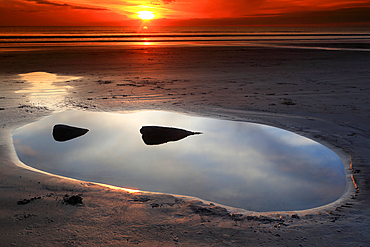 Sunset over the Bristol Channel from Dunraven Bay, Southerndown, South Wales, UK