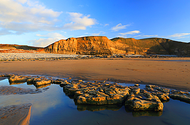 Limestone cliffs and beach, Dunraven Bay, Southerndown, Vale of Glamorgan, South Wales, United Kingdom