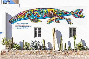 Loreto, Baja California Sur, Mexico. November 17, 2021. A colorful mural of a whale with a baby by Uli Martinez.