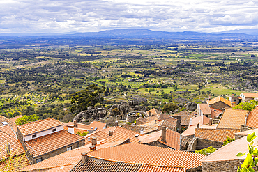 Europe, Portugal, Monsanto. Terra cotta roofs and rural Portugese landscape.