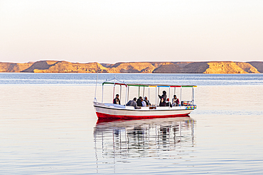 Lake Nasser, Abu Simbel, Aswan, Egypt. February 22, 2022. Tour boat on Lake Nasser on a calm evening.