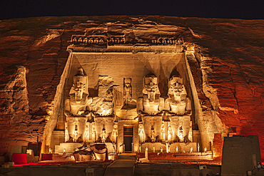 Abu Simbel, Aswan, Egypt. February 22, 2022. The colossal statues of the Great Temple of Ramesses II lit up at night.