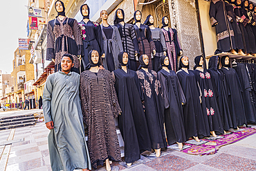 Thebes, Luxor, Egypt. February 24, 2022. Traditional abayas for sale at a clothing store in Luxor.