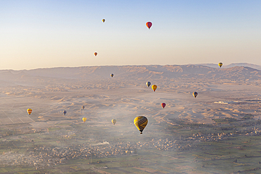 Luxor, Egypt. February 26, 2022. Hot air balloons taking tourist for a ride at Luxor.