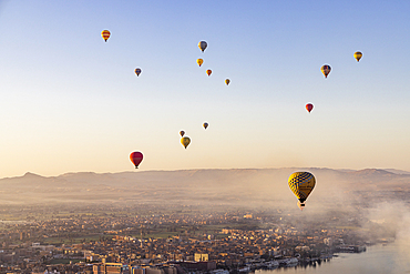 Luxor, Egypt. February 26, 2022. Hot air balloons taking tourist for a ride at Luxor.