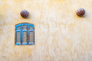 Faiyum, Egypt. Blue wooden shutters in the village of Faiyum.