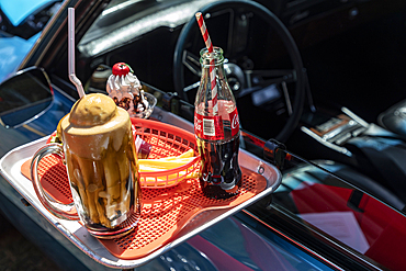 Marble Falls, Texas, USA. April 10, 2021. Automobile with a Drive-in food tray at a car show.