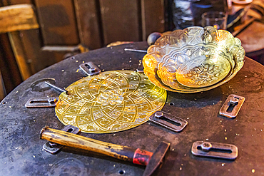 Cairo, Egypt. February 18, 2022. Decorative brass work at a shop on El Moez street in Old Cairo.