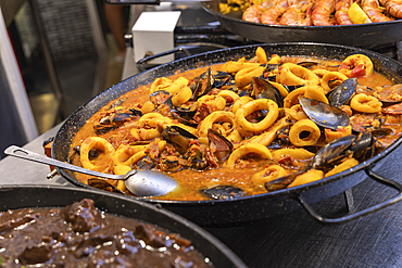 Saintes-Maries-de-la-Mer, Bouches-du-Rhone, Provence-Alpes-Cote d'Azur, France. Pot of bouillabaisse at a market in Provence.