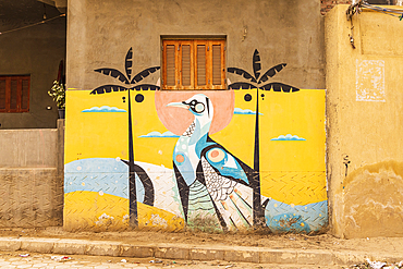 Faiyum, Egypt. February 19, 2022. Mural of a bird on a wall in Faiyum.