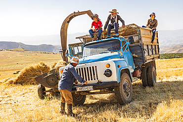 Shagmon, Khatlon Province, Tajikistan. August 12, 2021. Farm worker hand starting a truck during harvest. Editorial Use Only