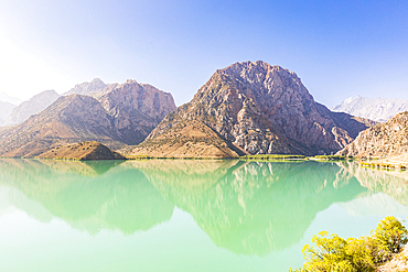 Iskanderkul, Sughd Province, Tajikistan. Mountains and blue sky above Iskanderkul Lake.