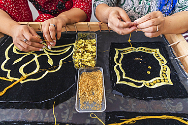 Panjakent, Sughd Province, Tajikistan. August 18, 2021. Craftsperson doing traditional needlework at the Historical Museum in Panjakent. Editorial Use Only