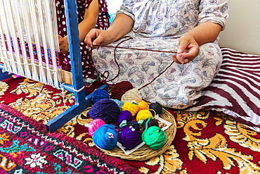 Panjakent, Sughd Province, Tajikistan. August 18, 2021. Craftsperson weaving at the Historical Museum in Panjakent. Editorial Use Only