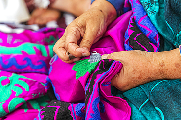 Panjakent, Sughd Province, Tajikistan. August 18, 2021. Craftsperson doing traditional needlework at the Historical Museum in Panjakent. Editorial Use Only