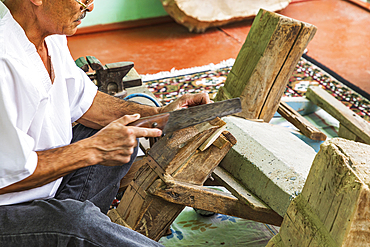 Istaravshan, Sughd Province, Tajikistan. August 19, 2021. Craftsman making wooden combs in Istaravshan. Editorial Use Only